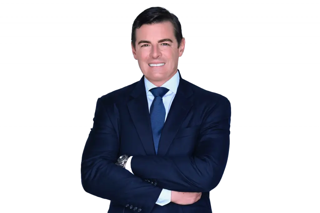 Michael White, DUI defense attorney, smiling with arms crossed in a professional suit, representing legal expertise in Broward County.