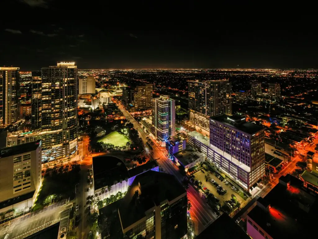 Fort Lauderdale skyline at night, showcasing illuminated buildings and busy streets in ZIP code 33301, relevant to DUI defense legal services.